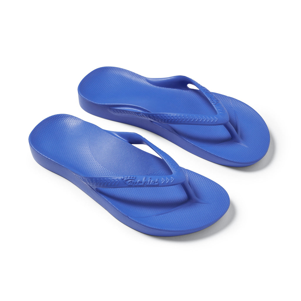 Royal Blue Arch support flip flops top down 3/4 studio image